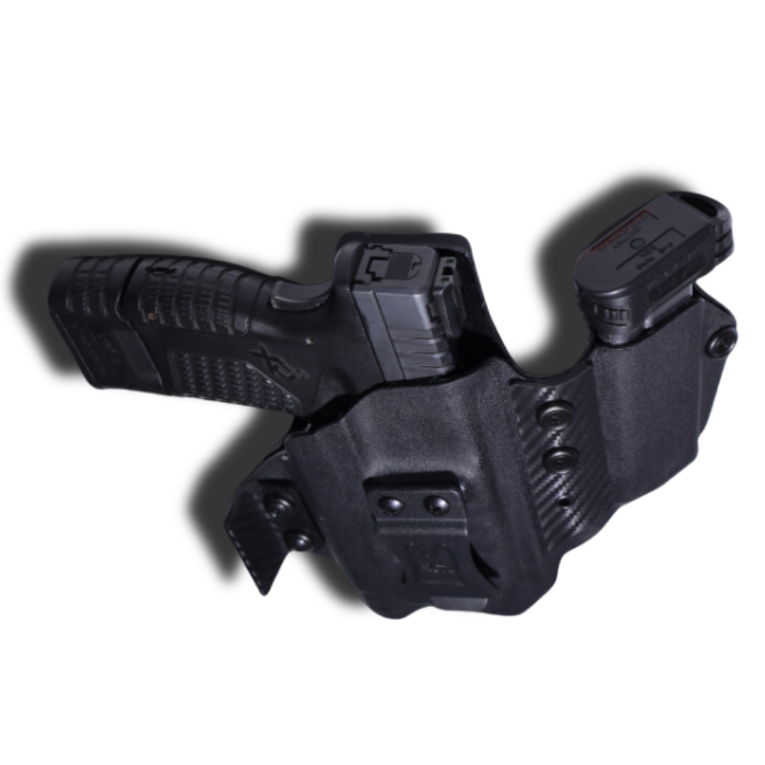 Concealed Holster with a Detachable Magazine Carrier