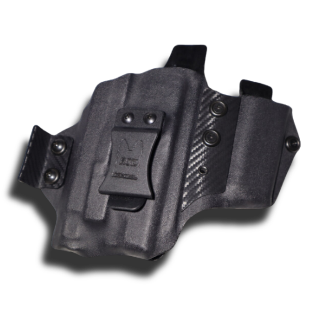 Concealed Holster with a Detachable Magazine Carrier